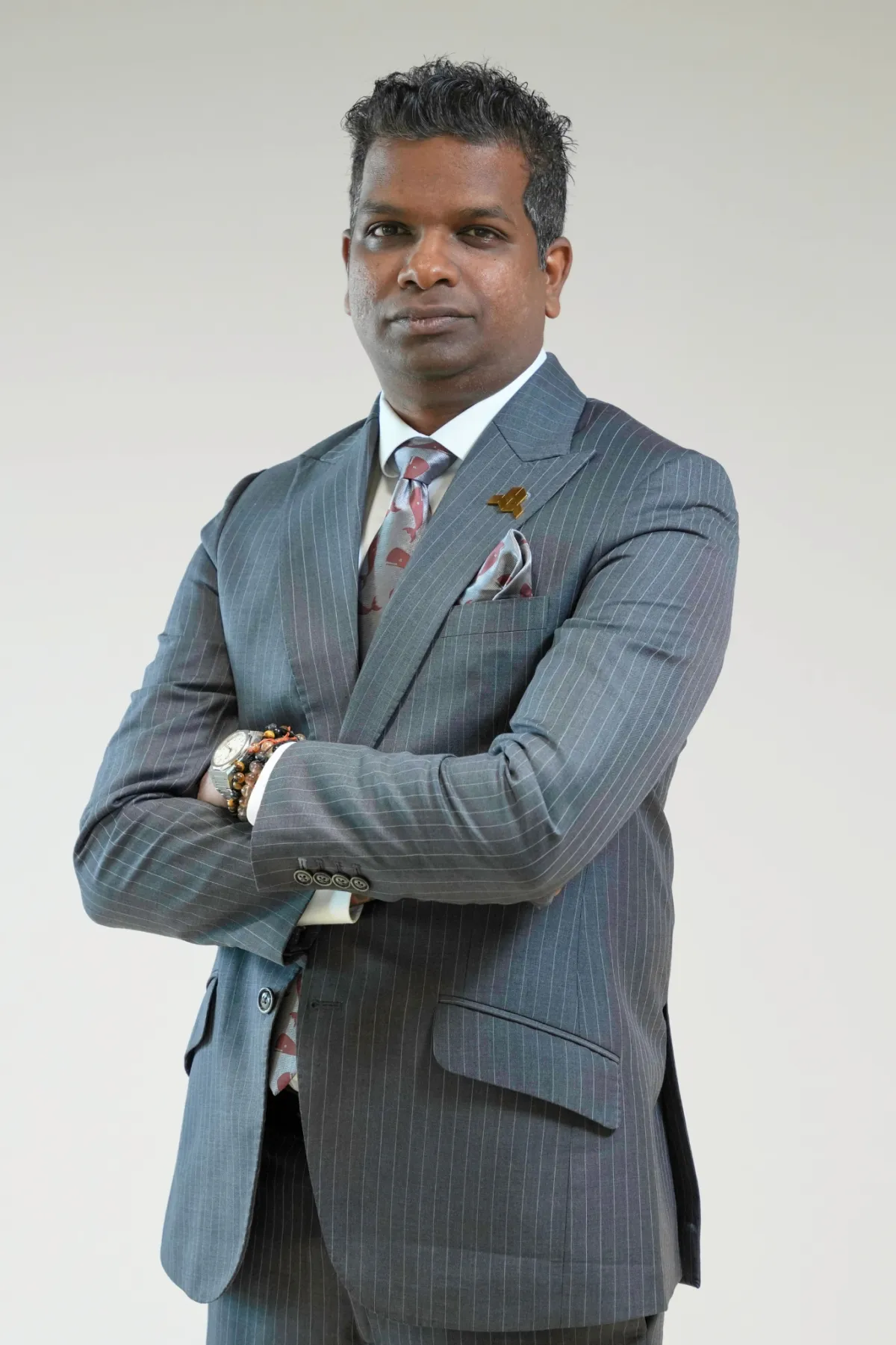 Professional headshot — distinguished style